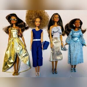 Lot of 4 Redressed Barbie Dolls